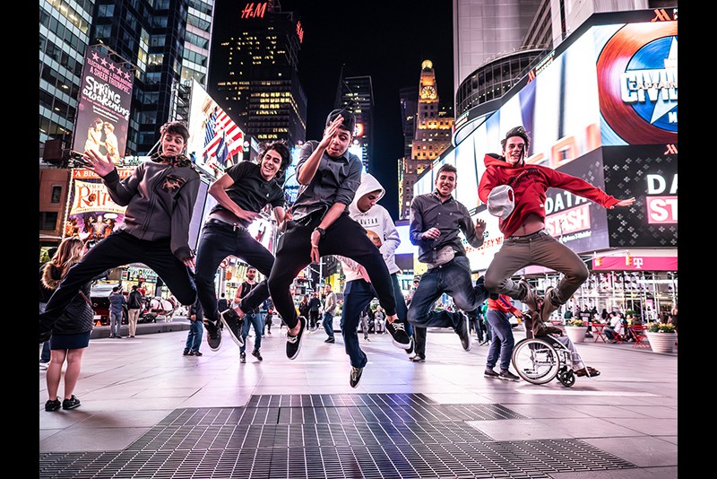 Michael Hing Times Square leap for Joy 